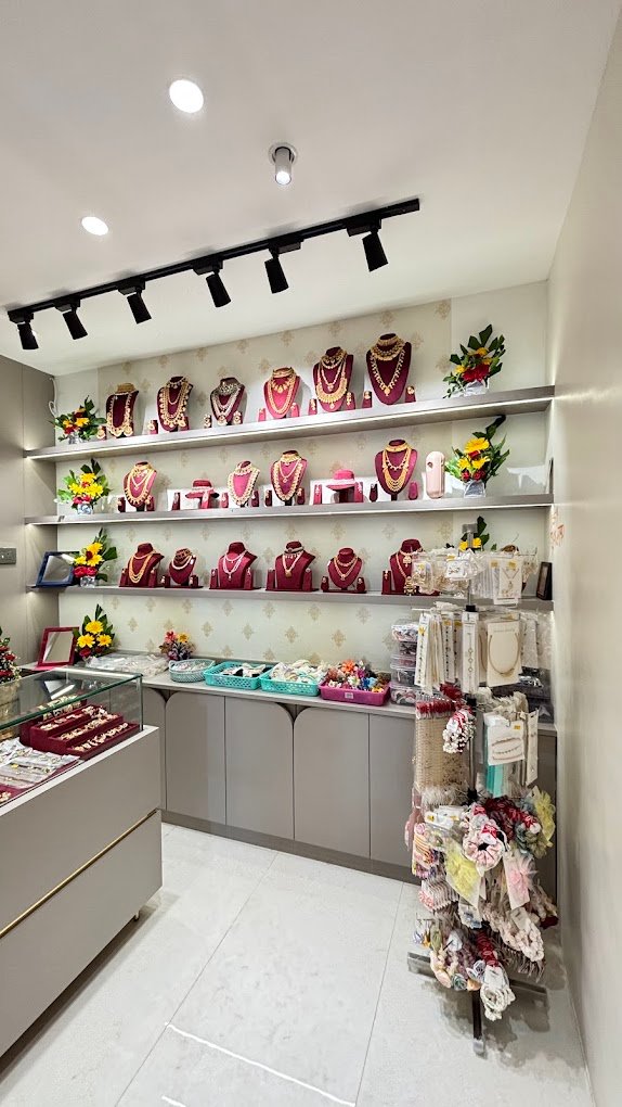 Necklace display shelves inside the studio